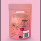 Eine Tüte Kenia und Guatemala Kaffeebohnen & Cascara Tee von Lazy Heroes GmbH auf rosa Hintergrund.